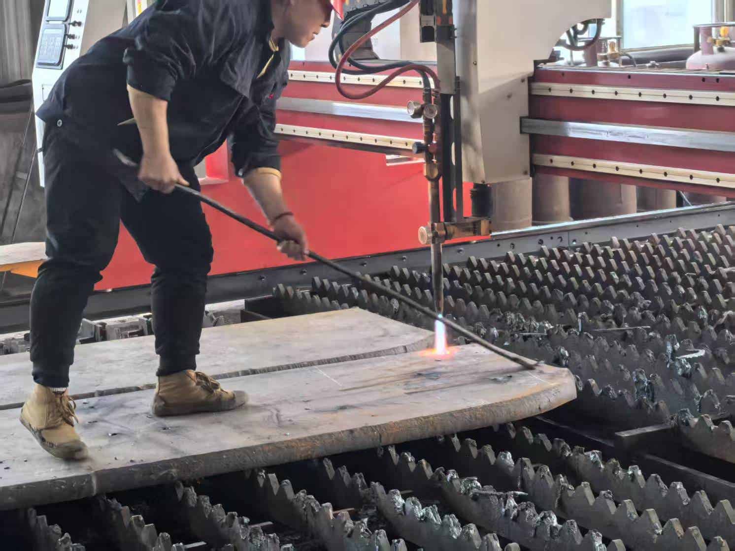 Our workers are cutting steel plates